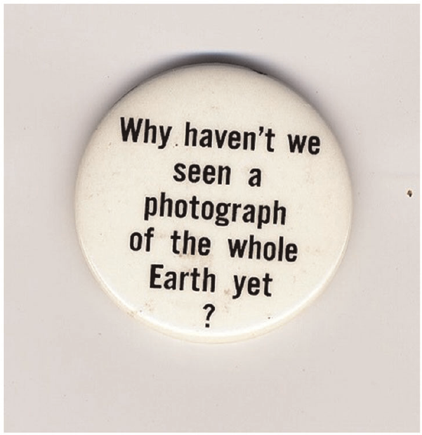 Campaign-button-1967-by-Stewart-Brand-Urging-NASA-and-the-Soviet-Union-to-release-a.png